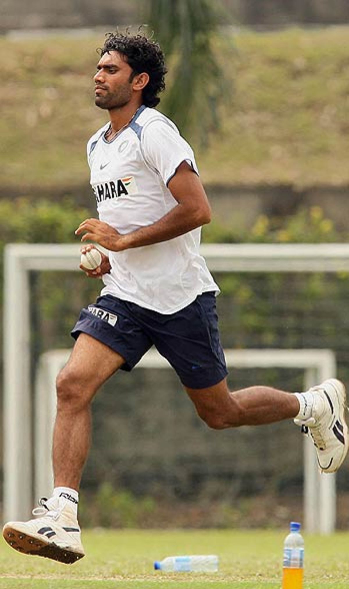 Munaf Patel Runs Into Bowl In The Nets Of The Kinrara Academy Oval