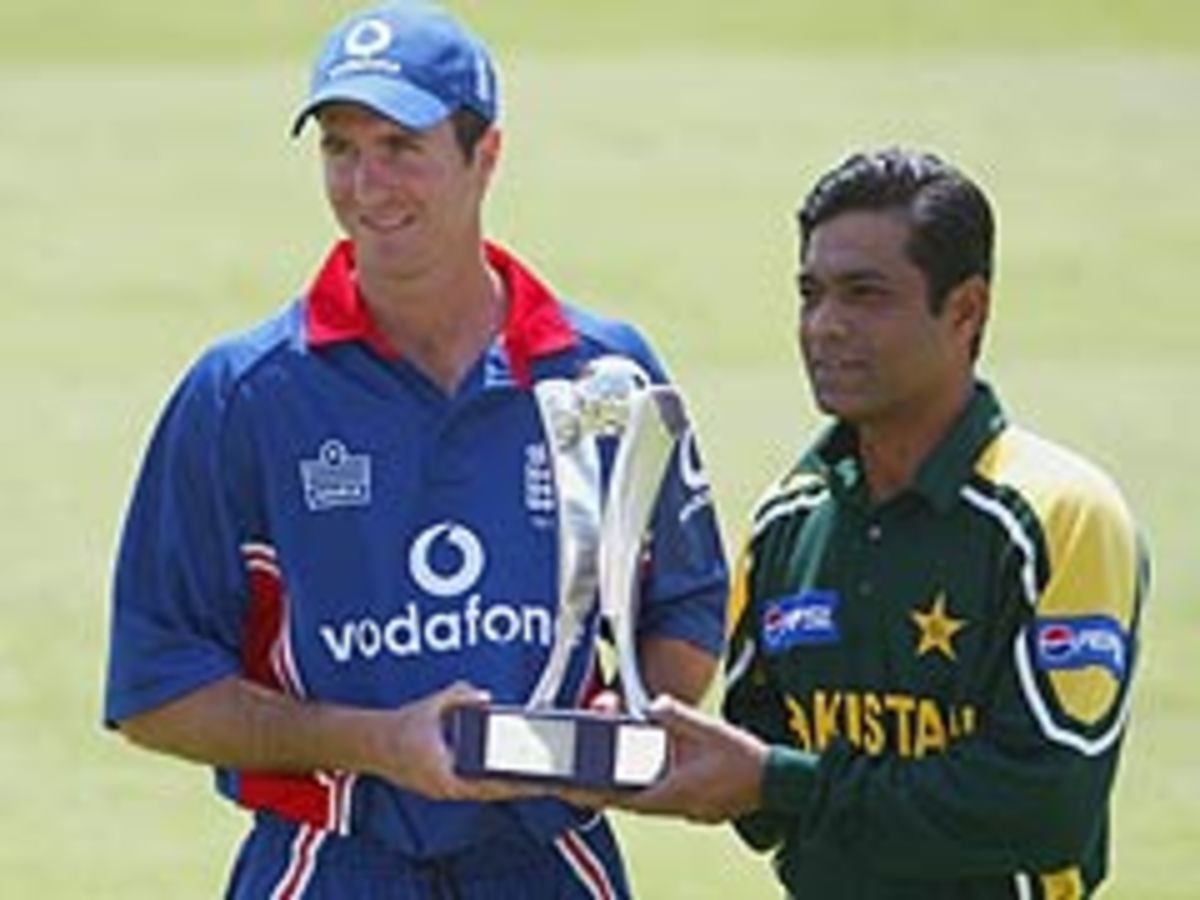 Michael Vaughan And Rashid Latif Pose With The Trophy Ahead Of The