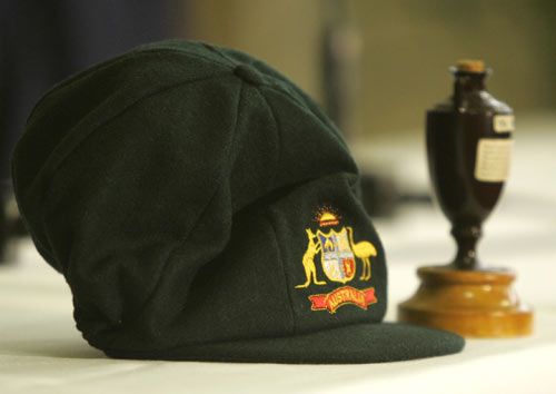 A Baggy Green Sits Next To A Replica Of The Ashes Trophy ESPNcricinfo