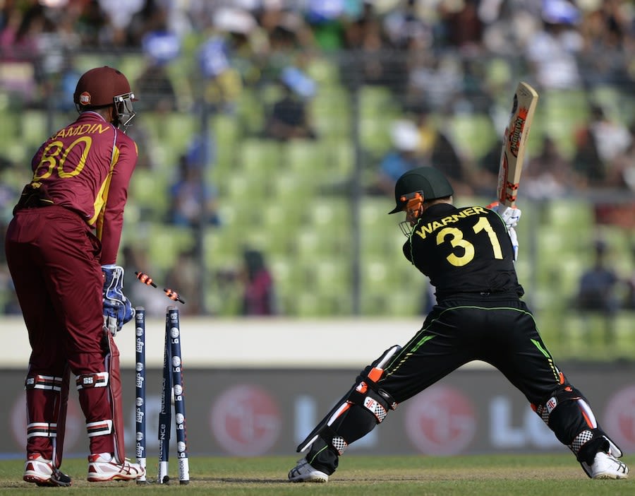 David Warner Is Bowled By A Quicker One From Samuel Badree