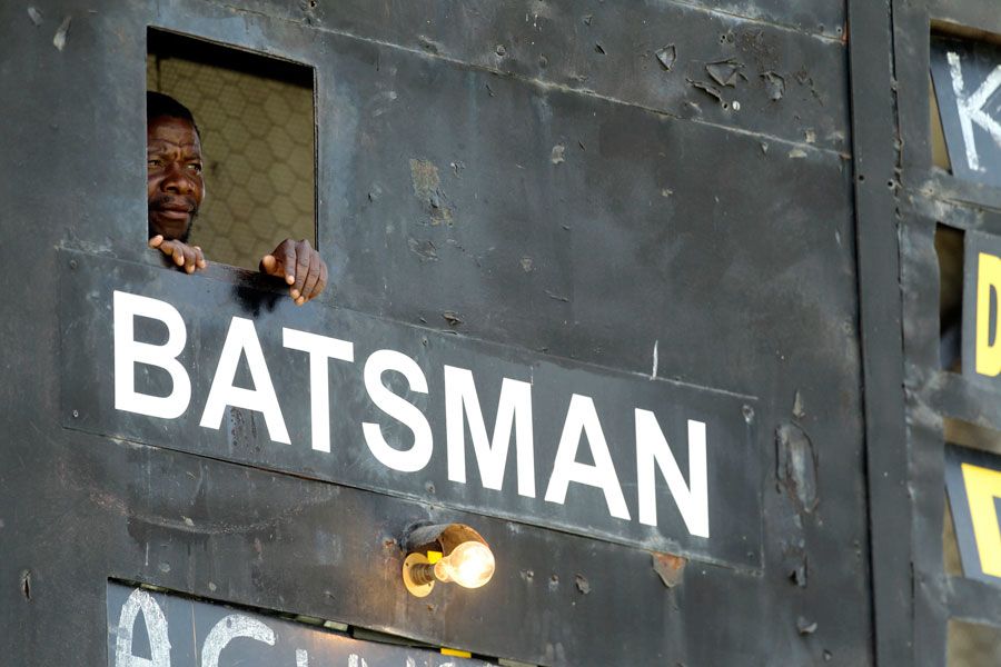 A Scoreboard Operator Watches Play At The Harare Sports Club