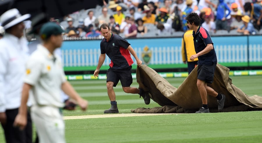 The Groundstaff Lug The Covers Onto The Mcg Pitch Espncricinfo