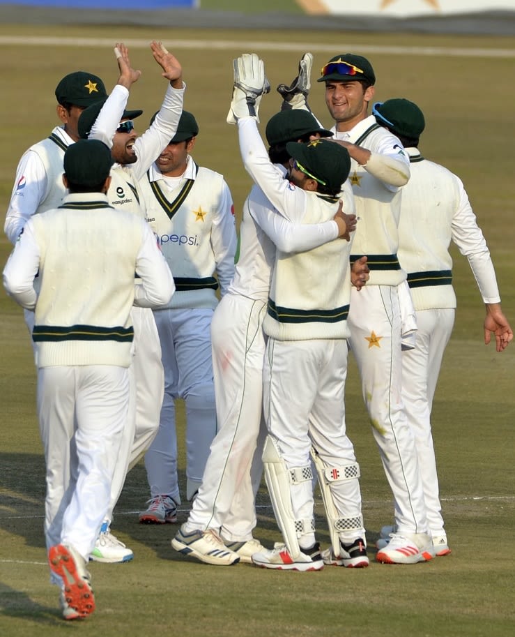 The Pakistan Players Celebrate A Wicket Espncricinfo