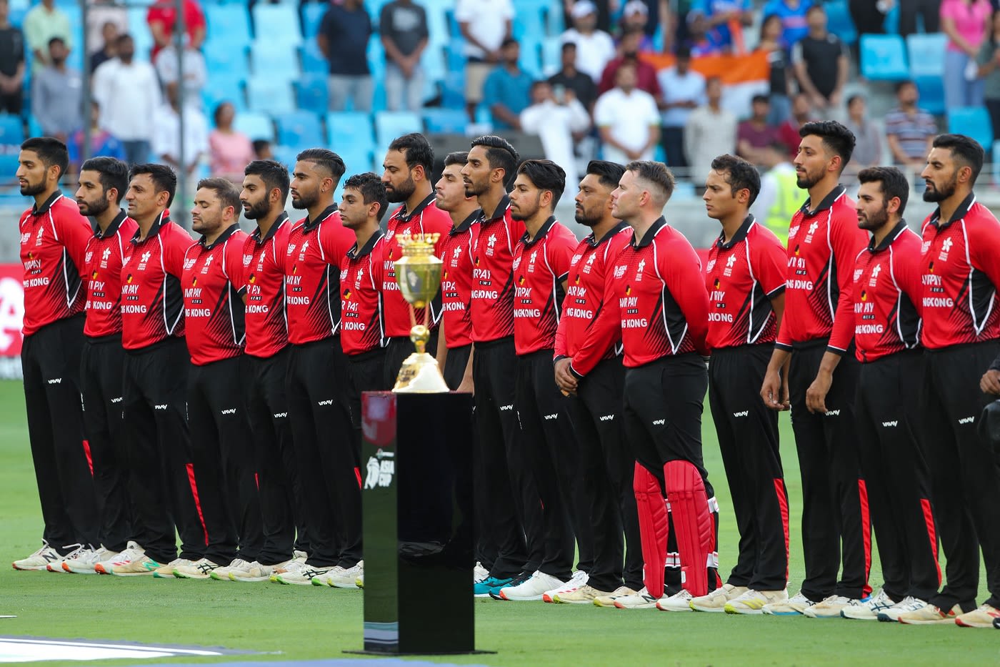 The Hong Kong Players Line Up For The National Anthem Espncricinfo