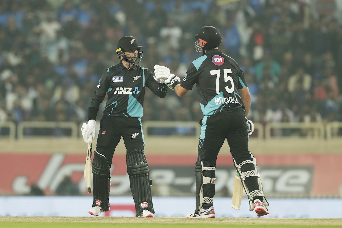 Daryl Mitchell And Devon Conway Punch Gloves Espncricinfo