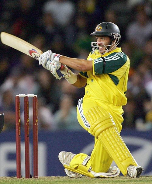 Mike Hussey Plays A Sweep Shot Espncricinfo