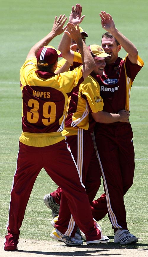 Chris Swan S Team Mates Congratulate Him On One Of His Four Wickets On