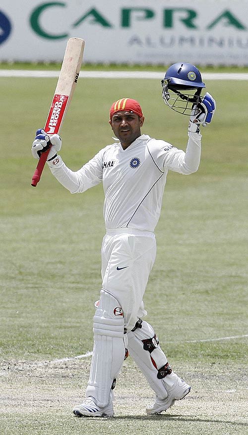 Virender Sehwag Acknowledges The Applause On Reaching A Century From