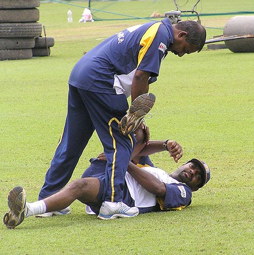 Muttiah Muralitharan Is Put Through A Routine By Team Masseur Lal