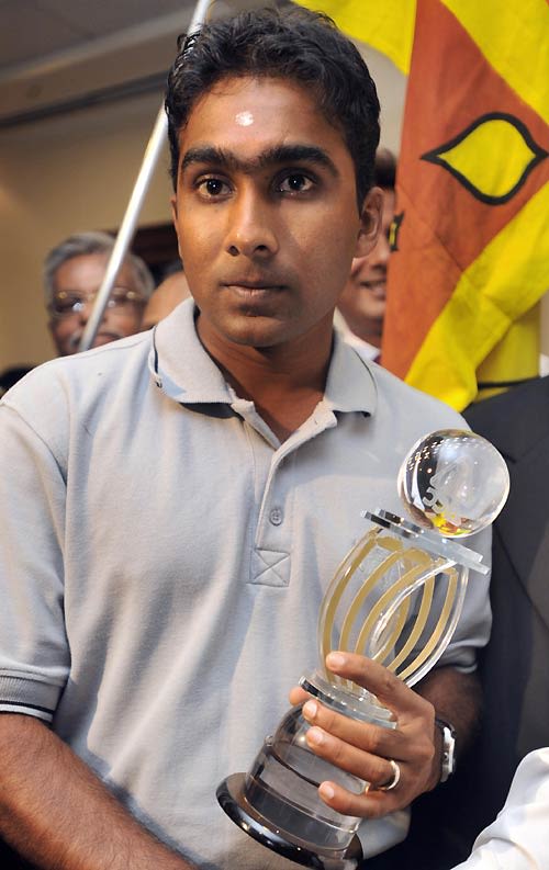 Mahela Jayawardene Poses With The Asia Cup Trophy On Arrival