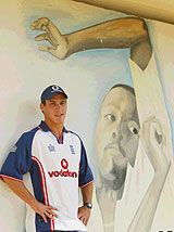 Simon Jones Poses In Front Of A Mural Of Courtney Walsh ESPNcricinfo