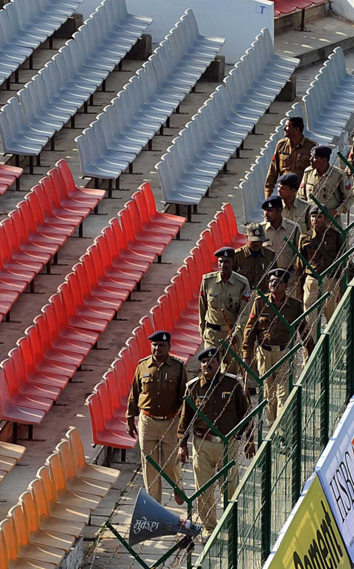Security guards do a round of the Captain Roop Singh Stadium