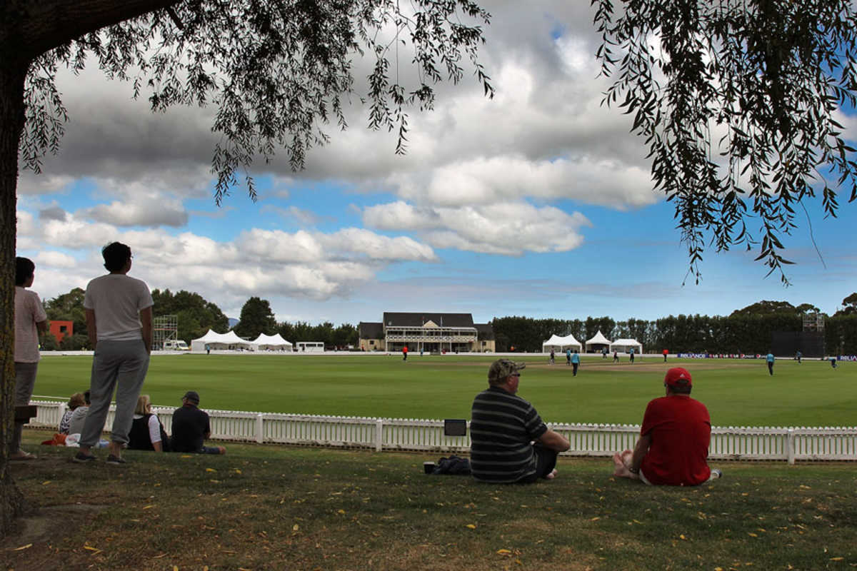 Spectators watch the match in serene surroundings at the Bert Sutcliffe Oval