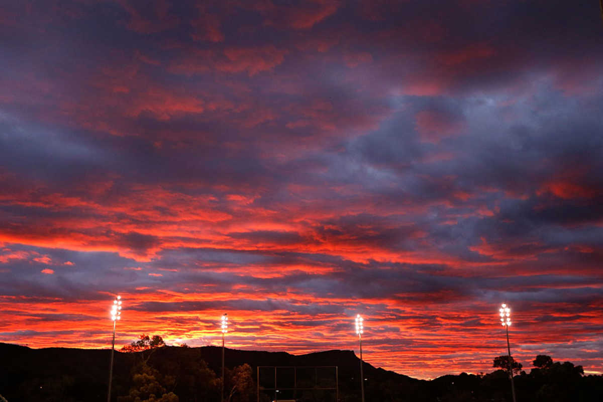 The sun sets over Traeger Park, Imparja Cup, Alice Springs, February 15, 2014