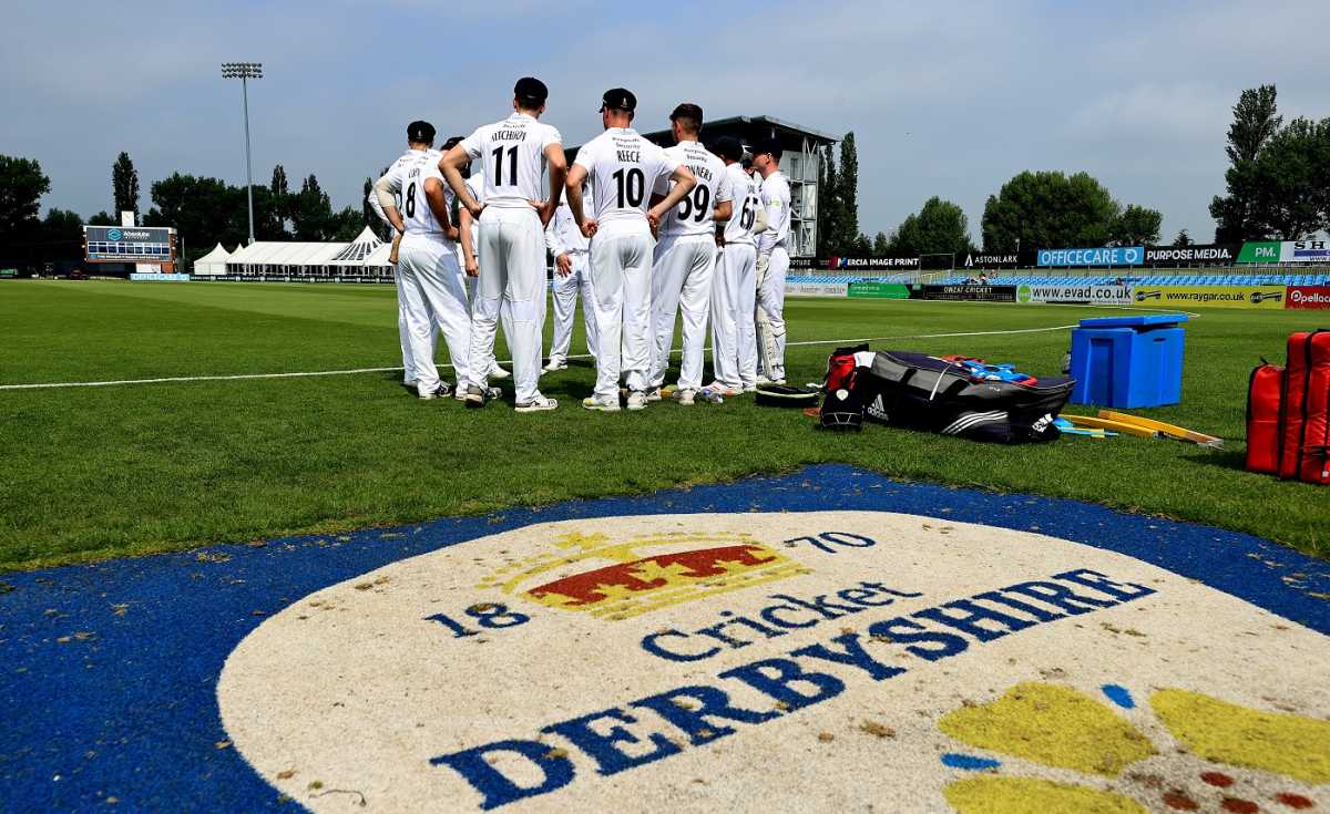 Derbyshire's players prepare to take the field