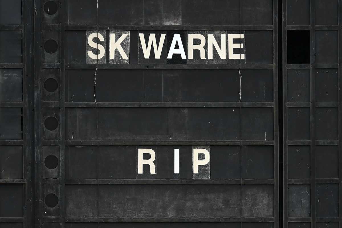 A tribute to Shane Warne at the old scoreboard at the Junction Oval before the start of game