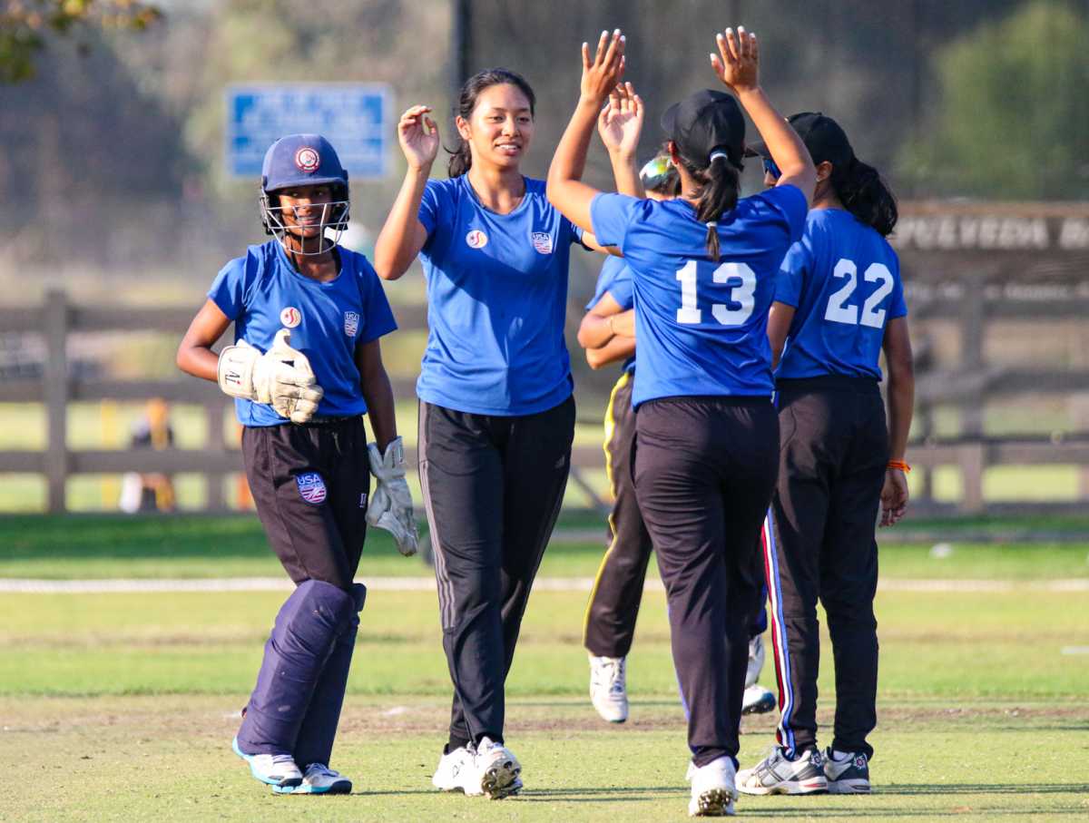 Medium pacer Jivana Aras gets a high five after taking a wicket at the 2022 USA Cricket Women's U19 National Championship