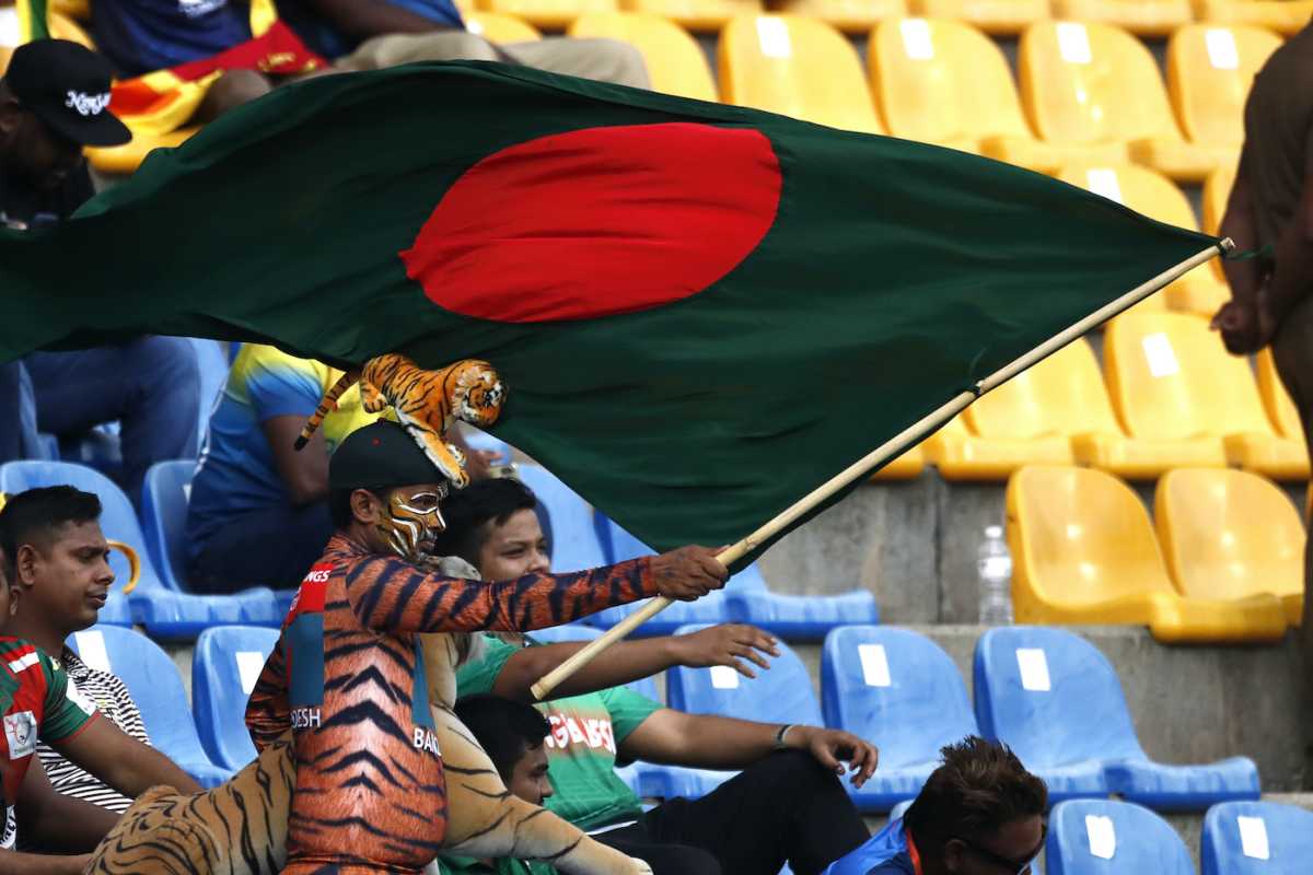 A Bangladesh supporter waves his flag in Pallekele