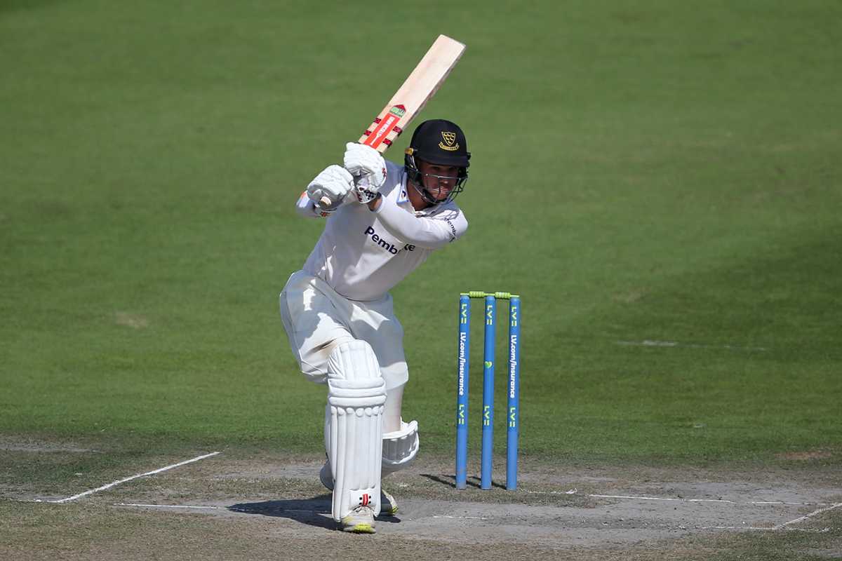 Tom Clark drives on his way to a fifty
