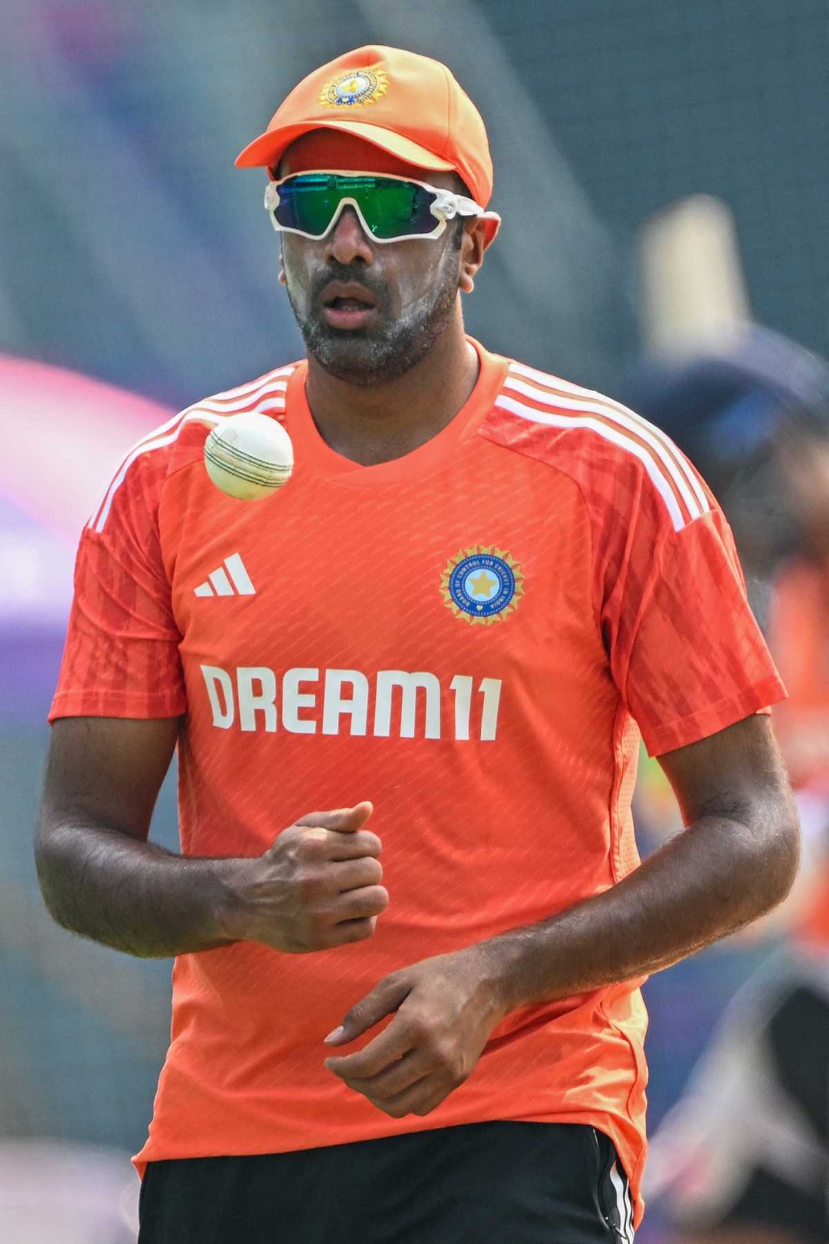 R Ashwin gets ready to bowl at the nets