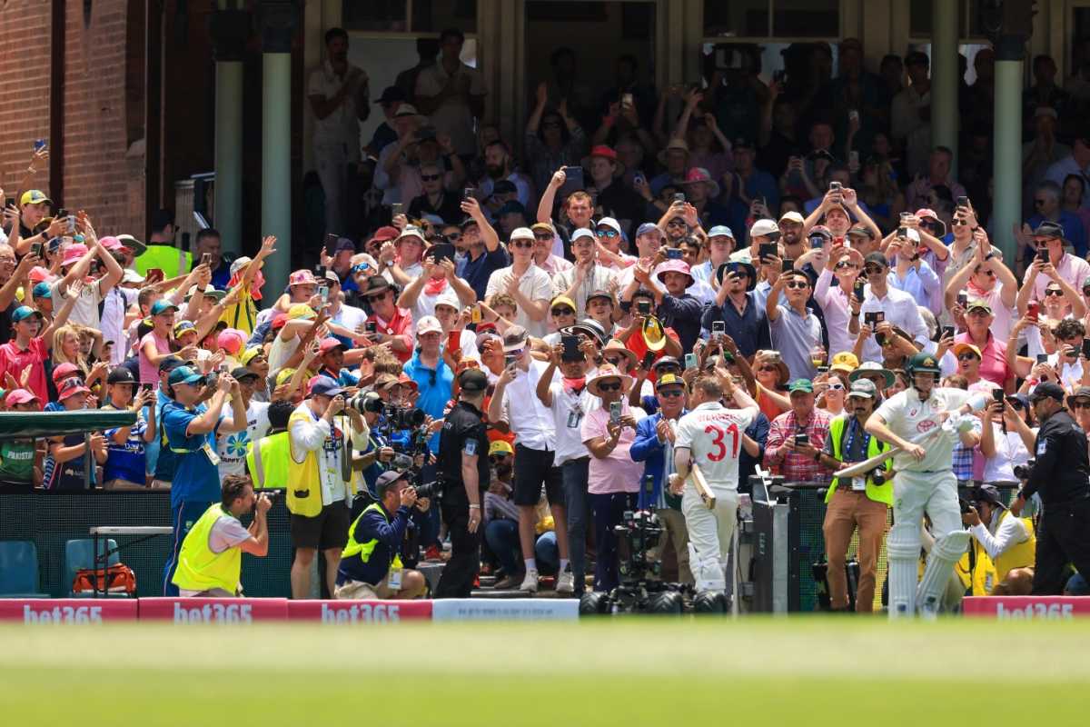 David Warner leaves the field for the final time in his farewell Test