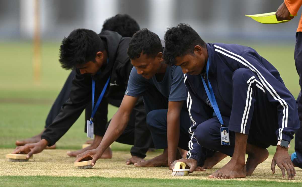 The Ranchi groundstaff get to grips with the wicket ahead of the fourth Test