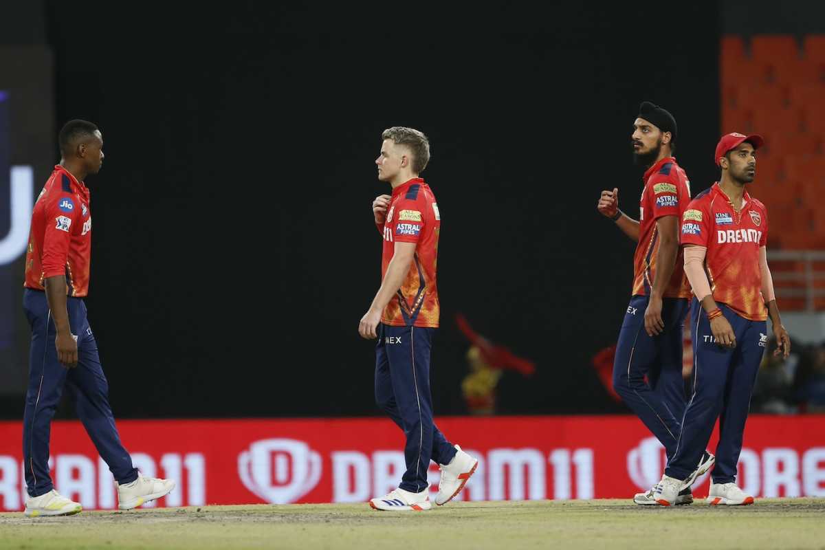 The Punjab Kings players wear a dejected look after the loss