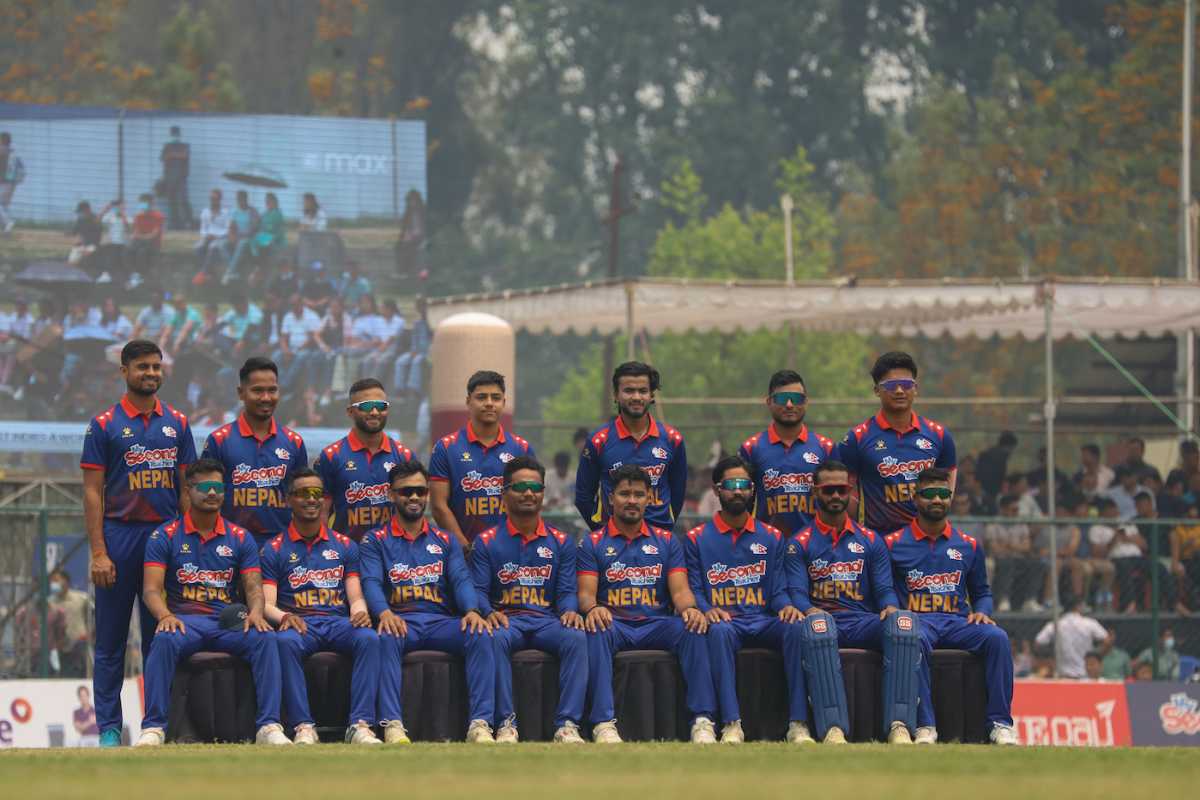 The 15-member Nepal squad for the T20 World Cup poses for an official photo