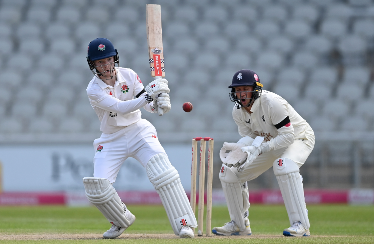 George Bell led Lancashire's rearguard at Old Trafford