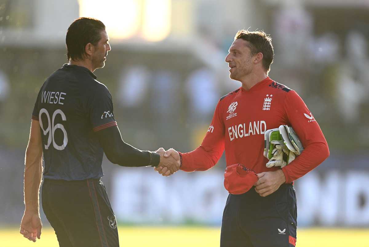 Jos Buttler shakes hands with David Wiese, England vs Namibia, T20 World Cup 2024, North Sound, June 15, 2024