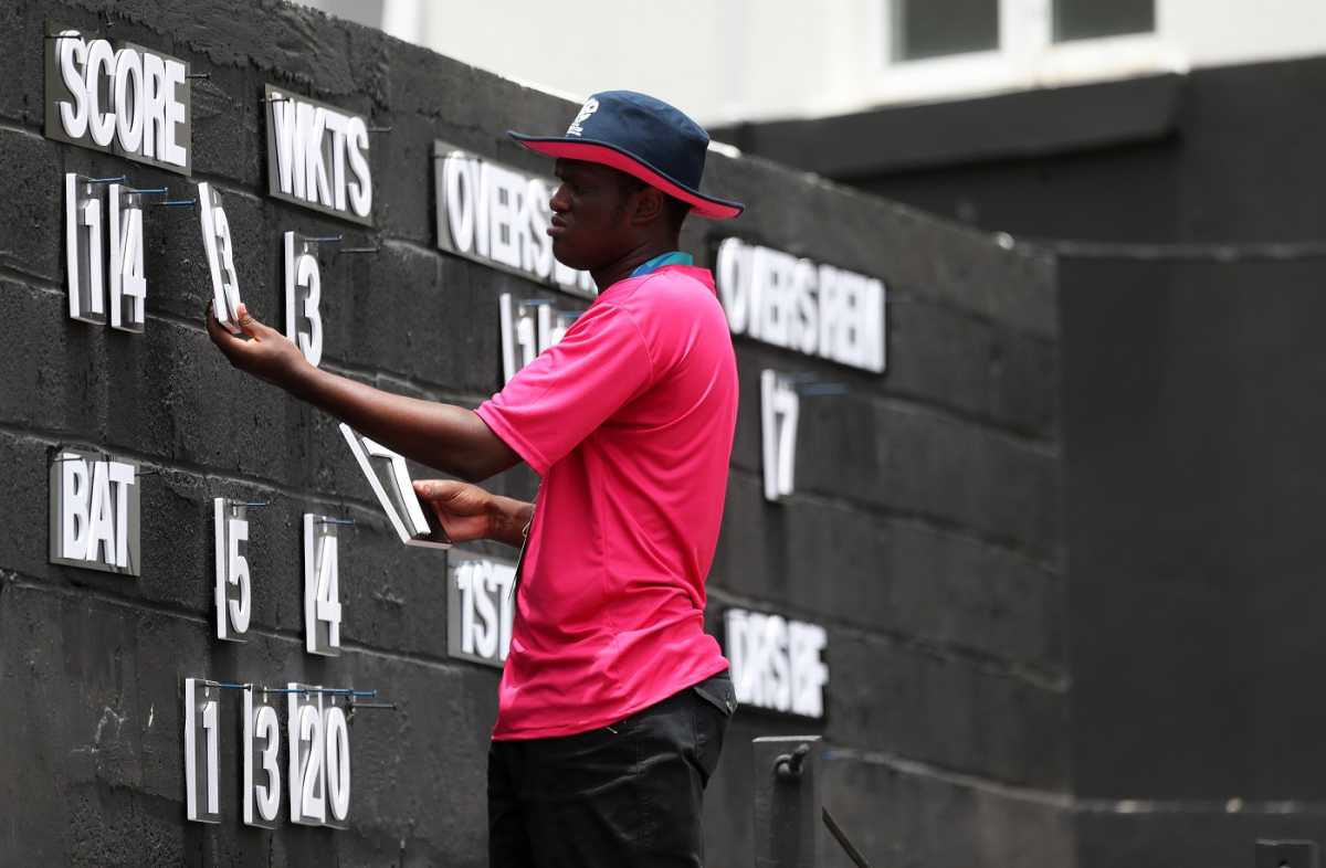 The scorer busy with his scoreboard at the Daren Sammy National Cricket Stadium, Australia vs India, T20 World Cup Super Eight, Gros Islet, June 24, 2024