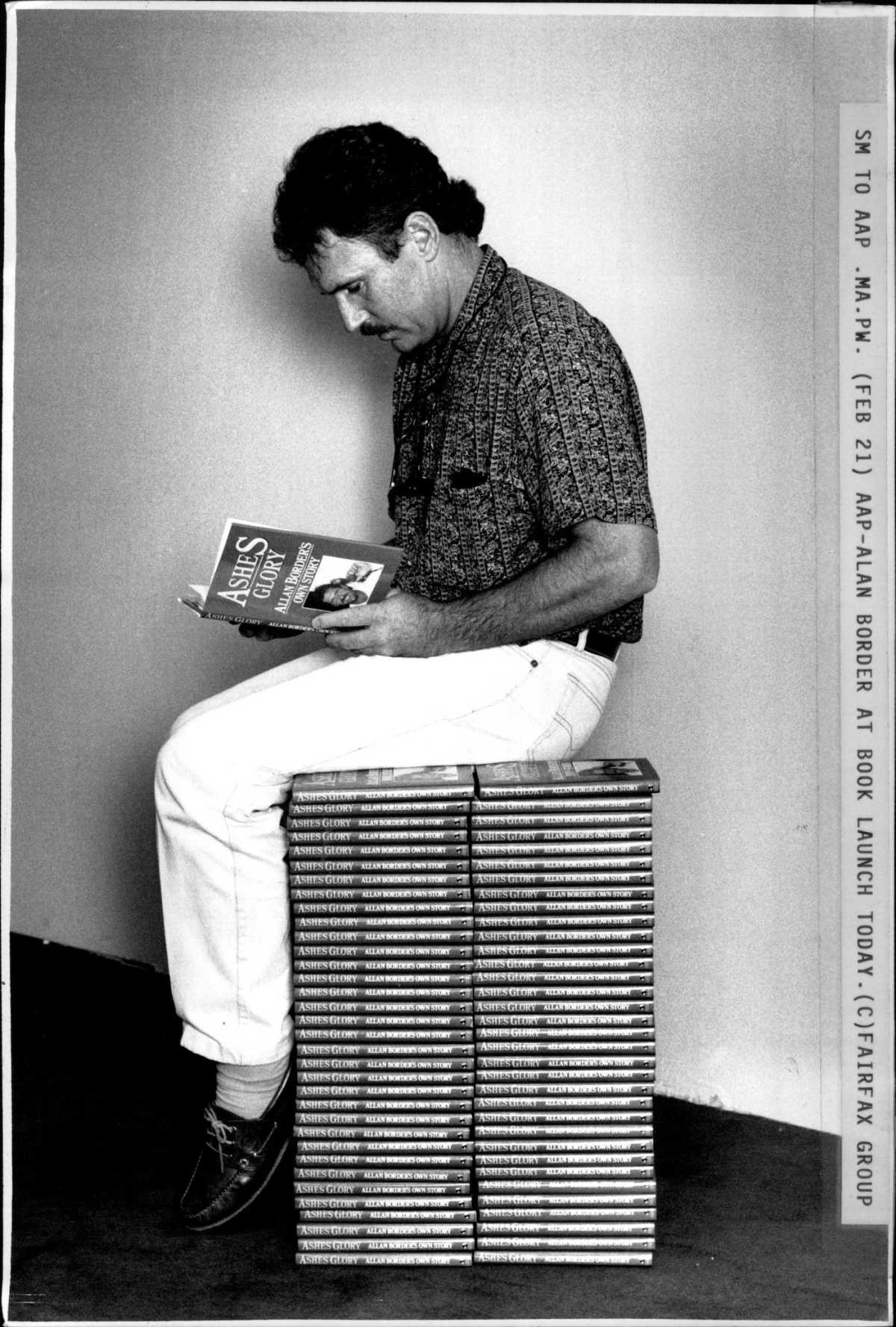Allan Border reads his own book at his book launch, Sydney, February 21, 1990