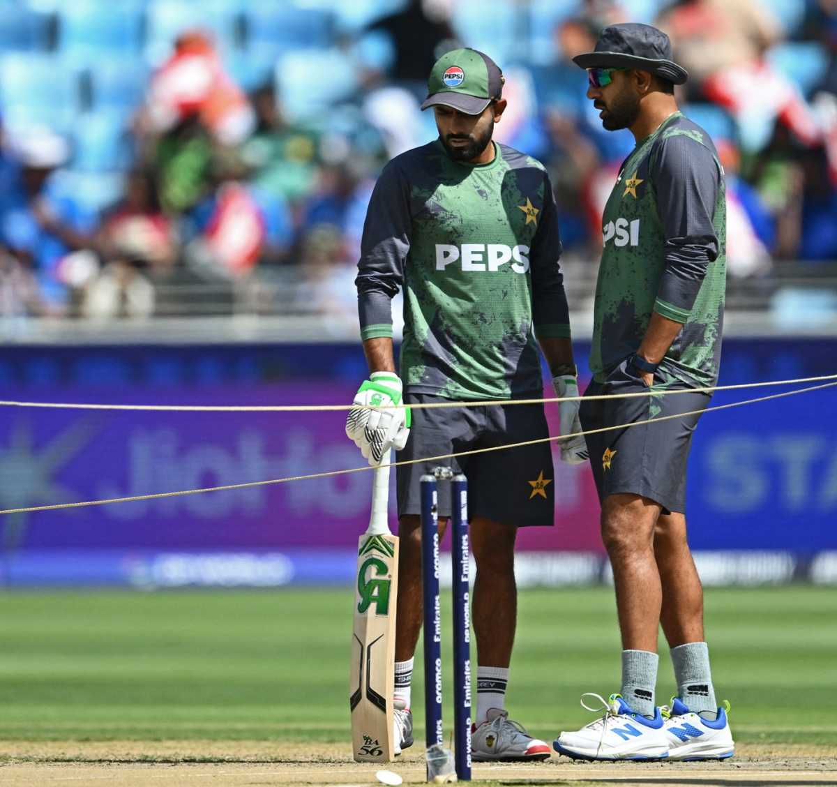 Babar Azam and Haris Rauf peer at the pitch, Pakistan vs India, ICC Men's Champions Trophy, Dubai, February 23, 2025