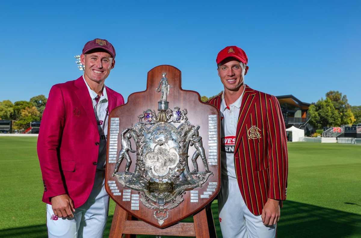 Queensland captain Marnus Labuschagne and South Australia captain Nathan McSweeney pose with the Sheffield Shield trophy