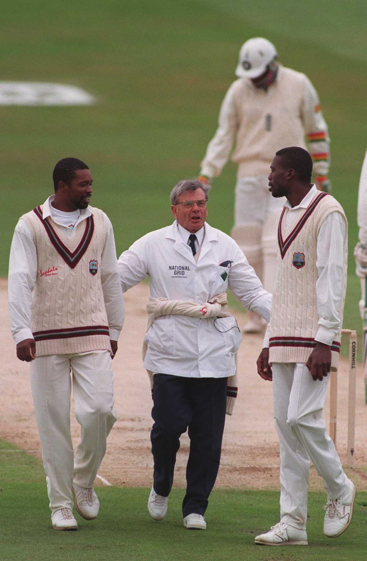 Dickie Bird talks to Kenny Benjamin and Curtly Ambrose about their short-pitched bowling in the first Test in 1995, England vs West Indies, 1st Test, Headingley, June 8, 1995