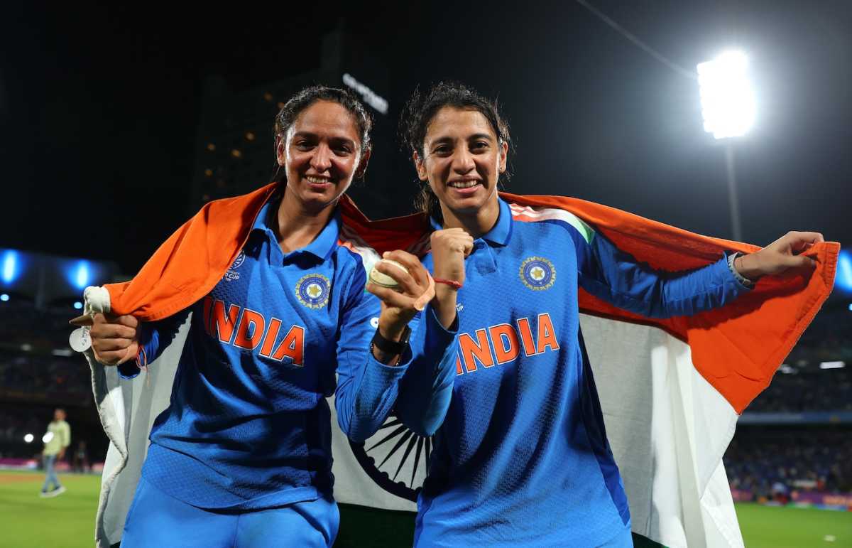 Harmanpreet Kaur, still clutching the match ball, and Smriti Mandhana celebrate, India vs South Africa, Women's ODI World Cup final, Navi Mumbai, November 2, 2025