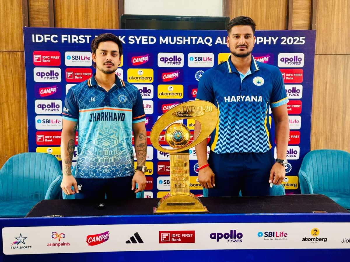 Ishan Kishan and Ankit Kumar, the two captains, pose with the trophy, Jharkhand vs Haryana, Syed Mushtaq Ali Trophy final, Pune, December 17, 2025
