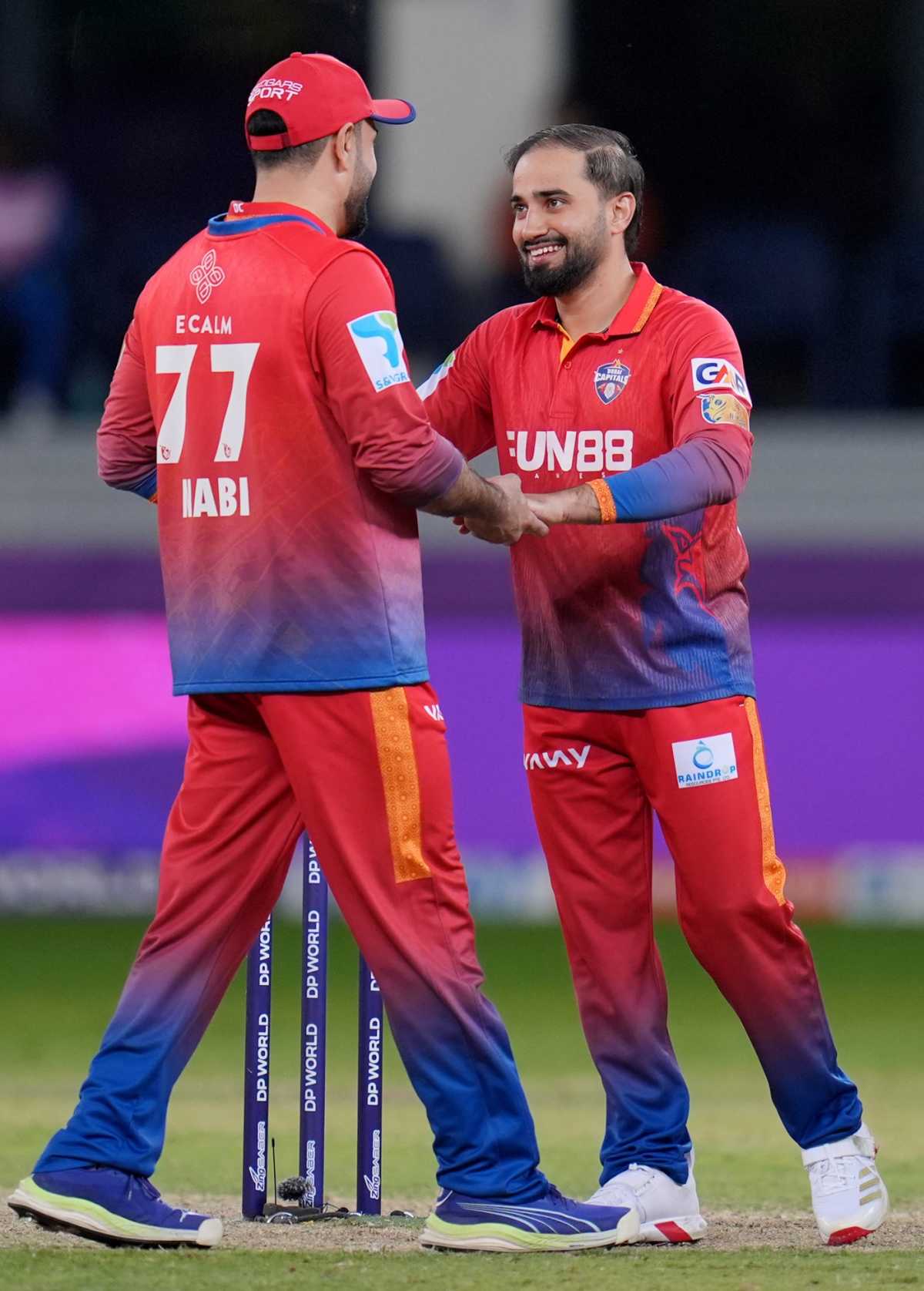 Waqar Salamkheil celebrates a wicket with Mohammad Nabi, Abu Dhabi Knight Riders vs Dubai Capitals, ILT20 2025-26, Dubai, January 1, 2026
