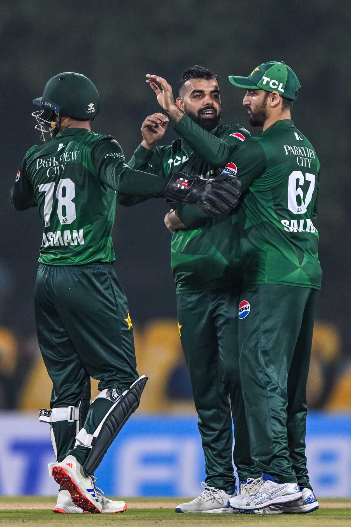 Usman Khan and Salman Agha congratulate Shadab Khan for dismissing Dhananjaya de Silva, Sri Lanka vs Pakistan, 1st T20I, Dambulla, January 7, 2026