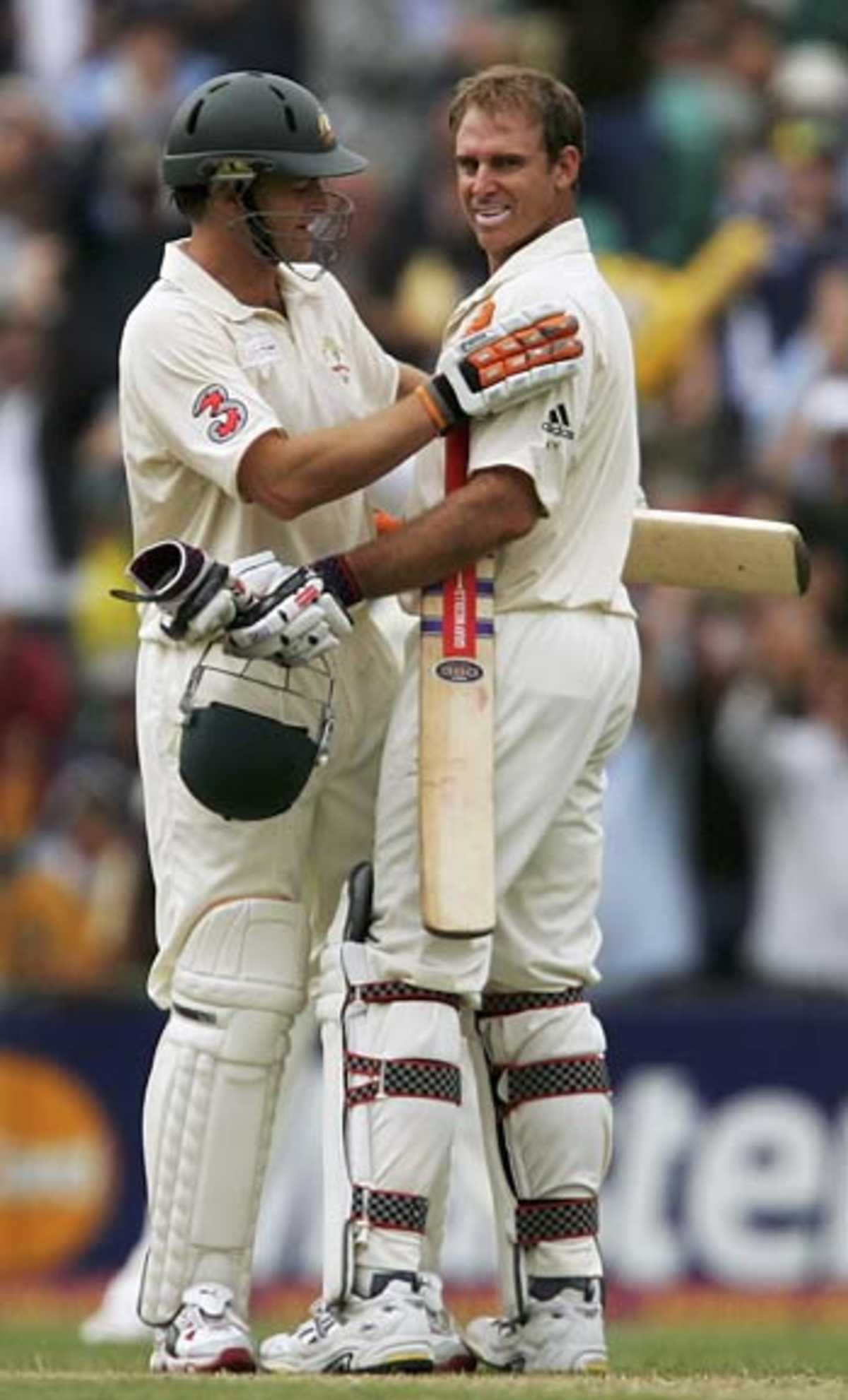 Matthew Hayden is congratulated by Adam Gilchrist on reaching his hundred, Australia v World XI, Day 1, Sydney Cricket Ground, October 14, 2005