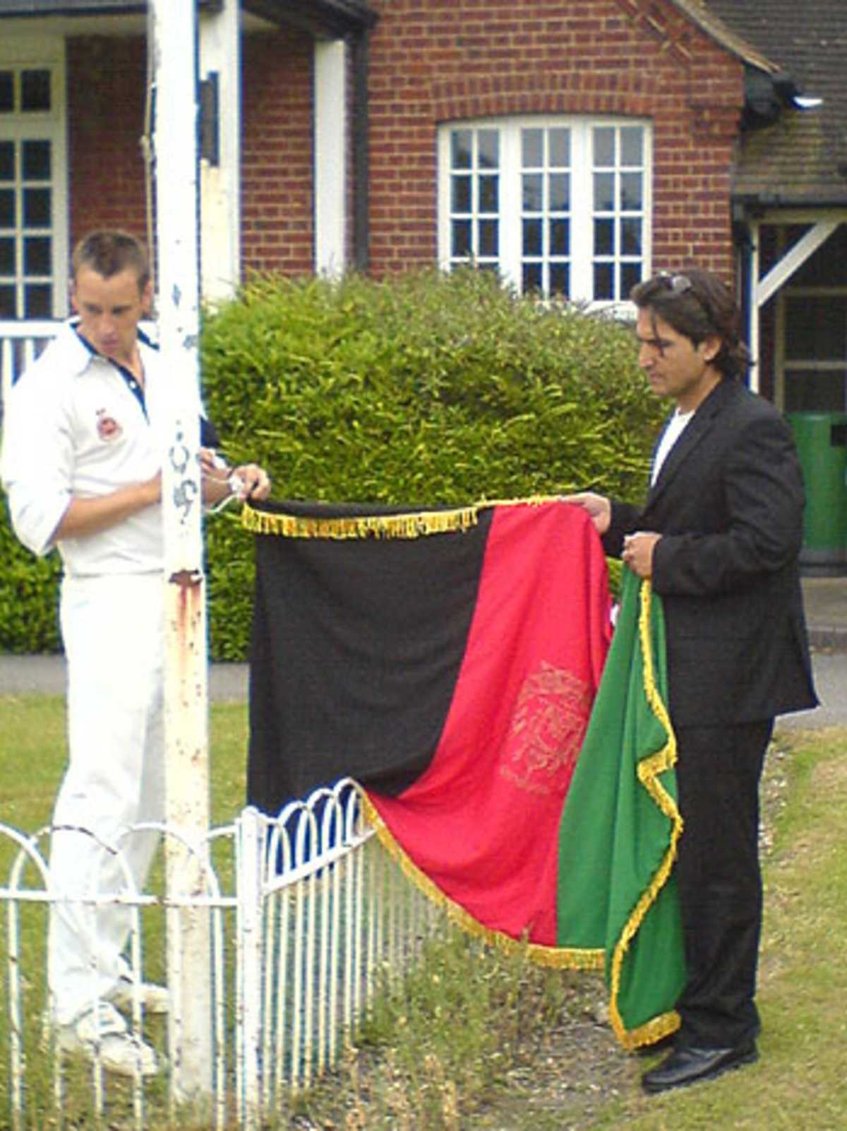The Afghanistan flag is raised at the Royal Military Academy, Sandhurst, June 14, 2006