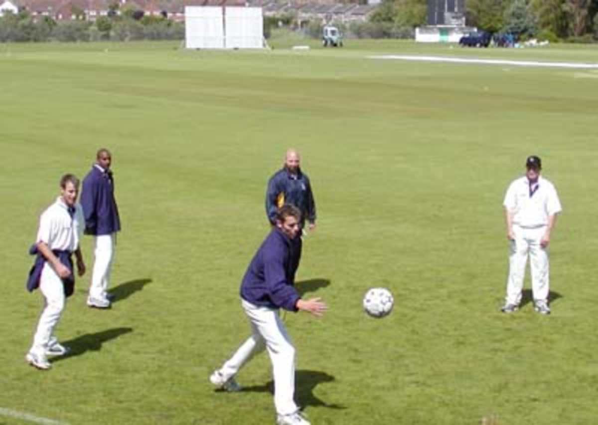 Players take the opportunity to show their World Cup skills whilst waiting for play at Folkestone
