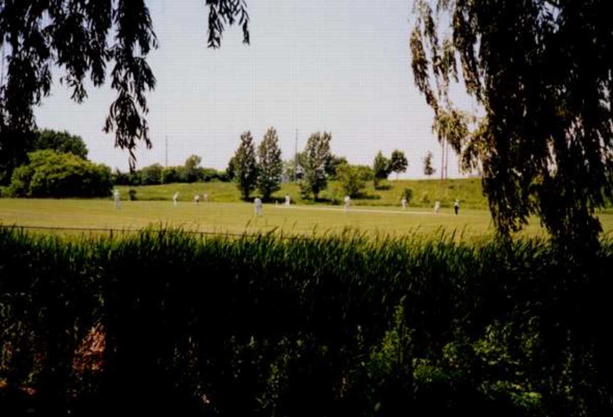 Eglinton Flats west ground, Toronto, venue for ICC Trophy 2001 matches; Warm-up game between Uganda and Ireland in progress