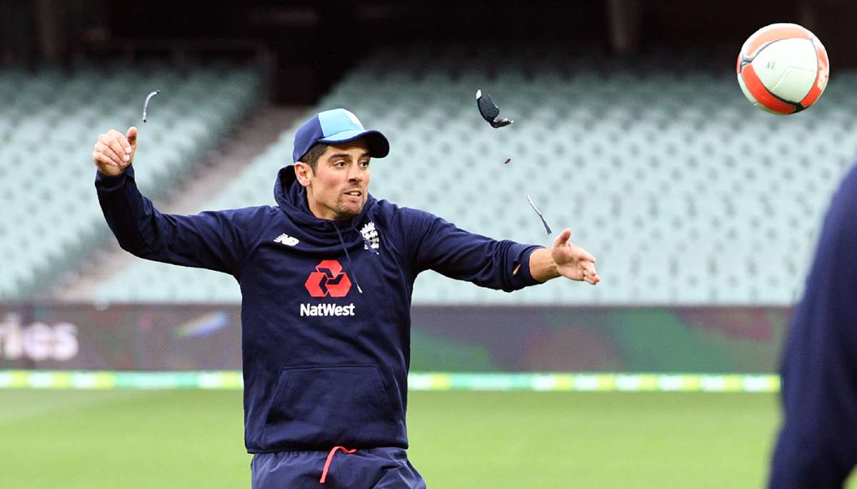 Alastair Cook s sunglasses break after he heads a football during practice ESPNcricinfo