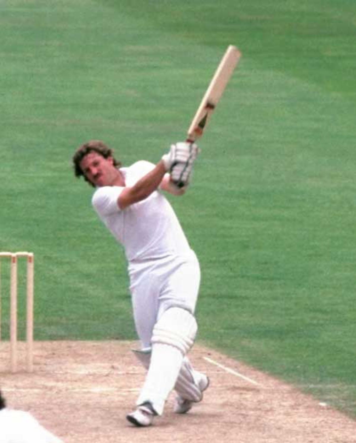 Ian Botham launches one over the top on his way to a Testbest 208