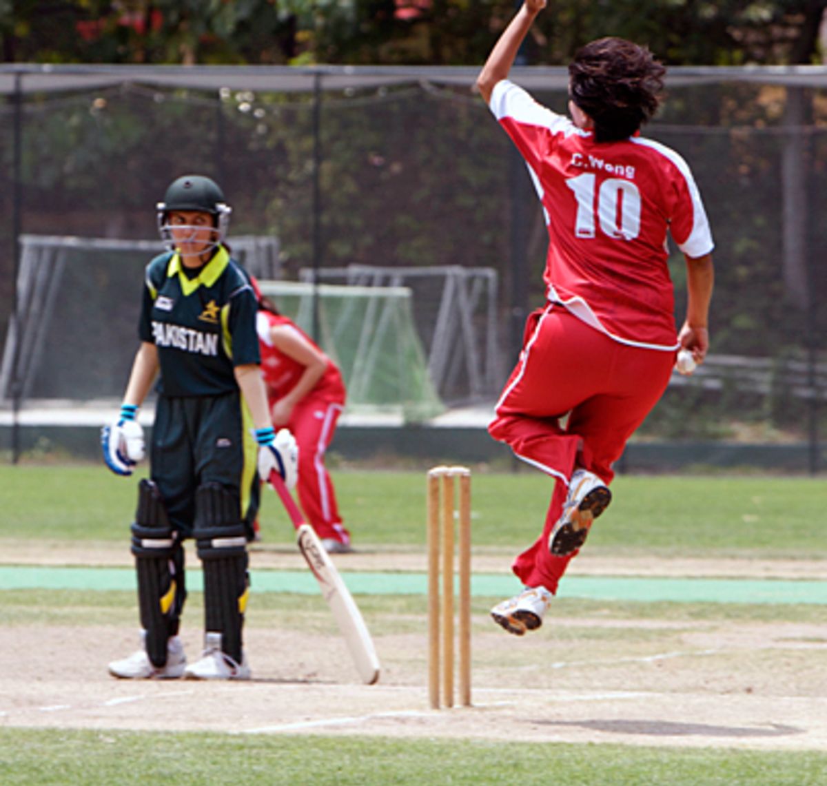 Connie Wong bowling for HK Women against Pakistan 'A' Women
