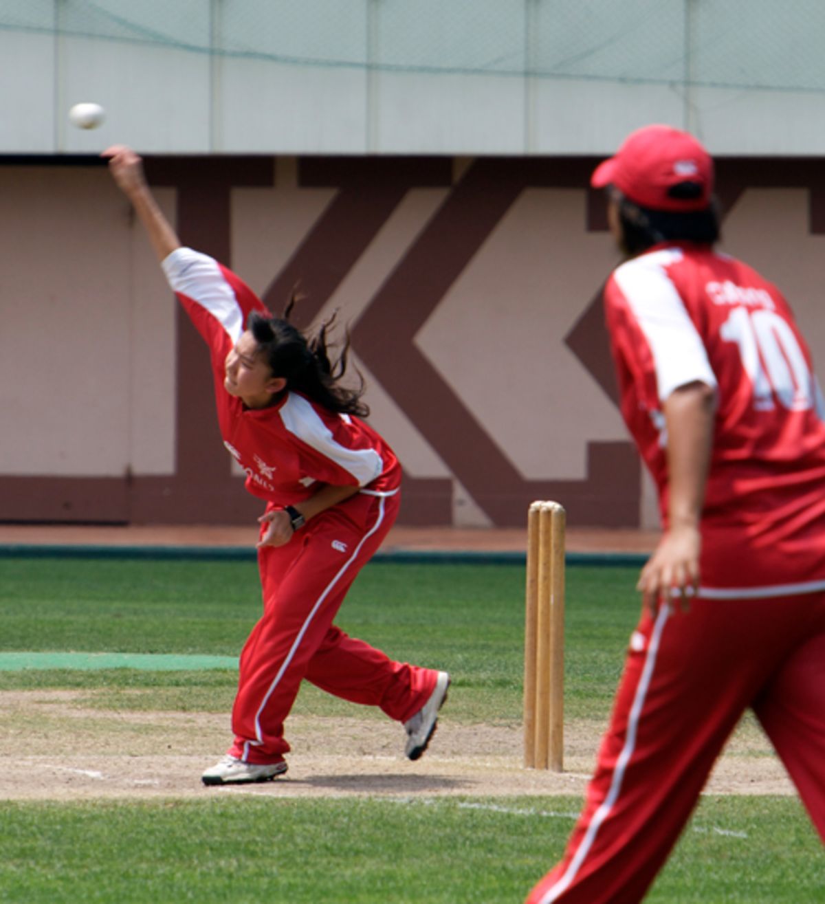 Godiva Li bowling for HK Women against Pakistan 'A' Women
