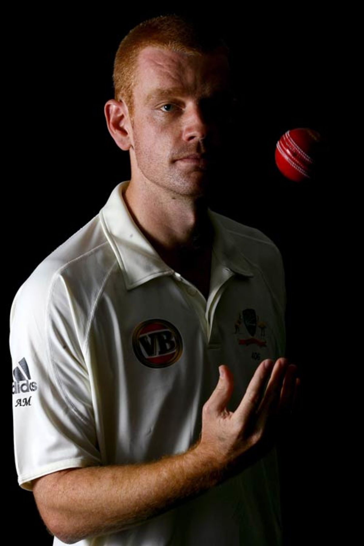 Andrew McDonald poses with a ball at Australia's team camp