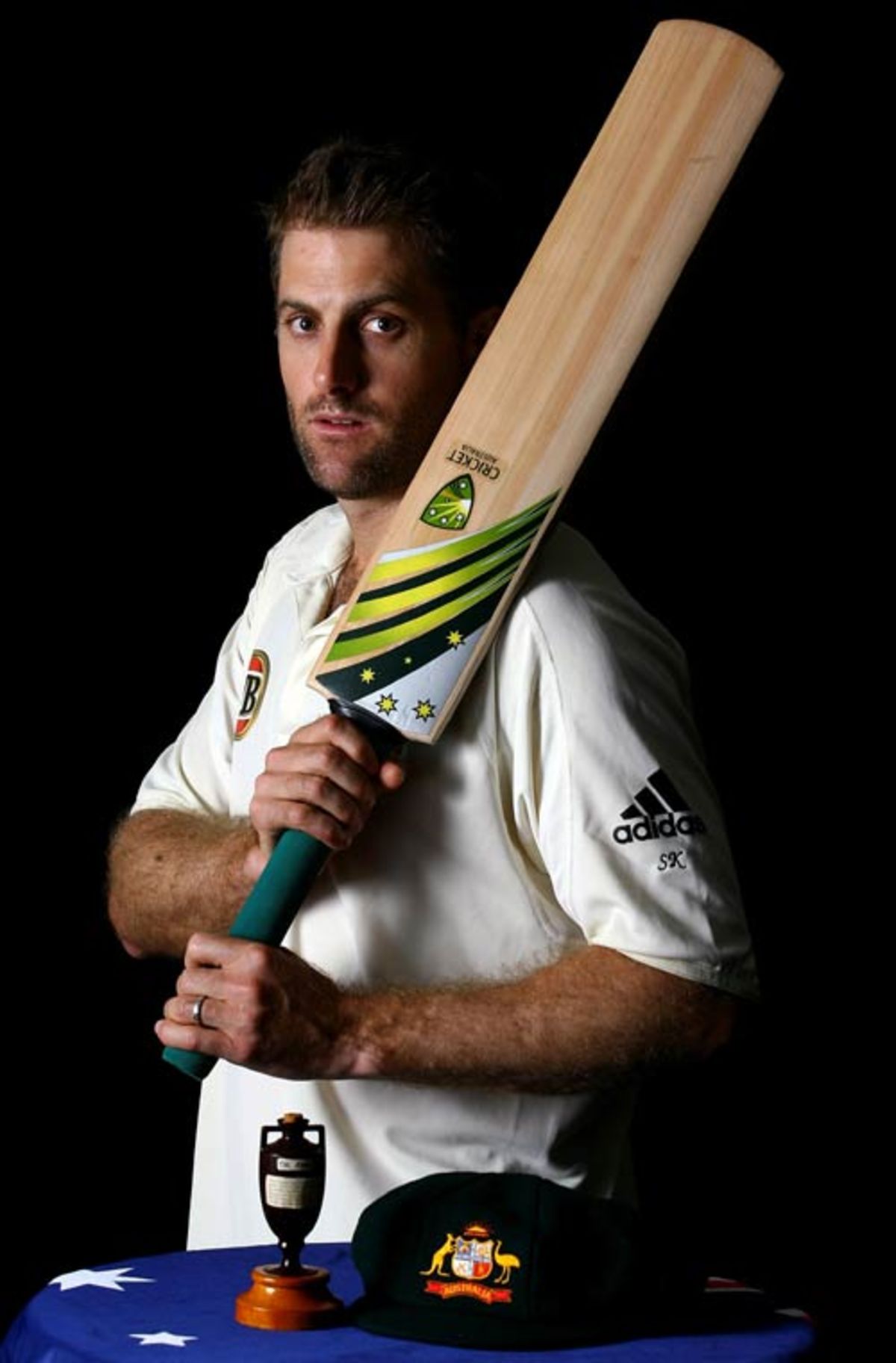 Michael Clarke poses with a replica Ashes urn
