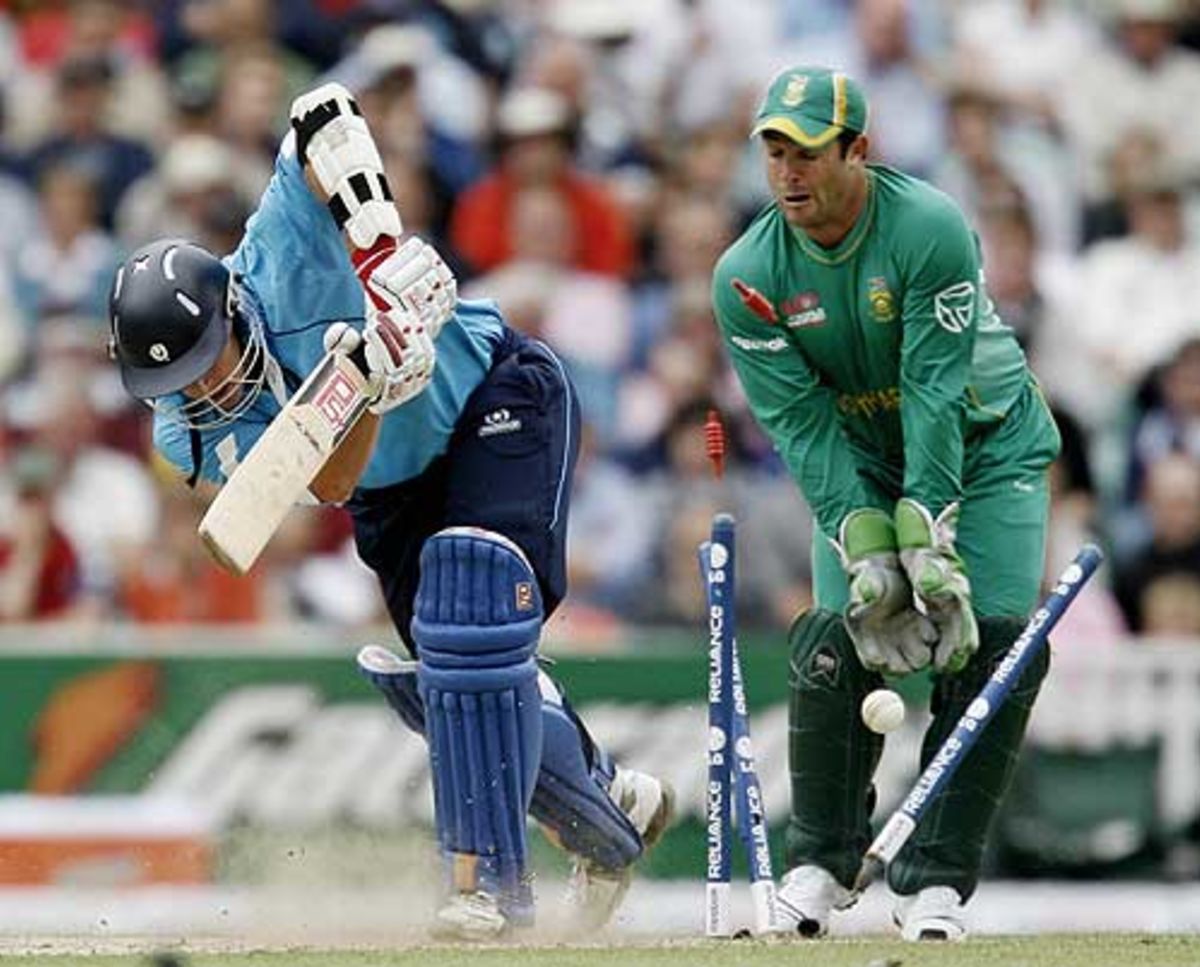 Neil McCallum is yorked by Johan Botha